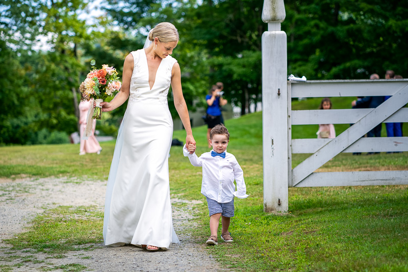 Bride walking with ring bearer