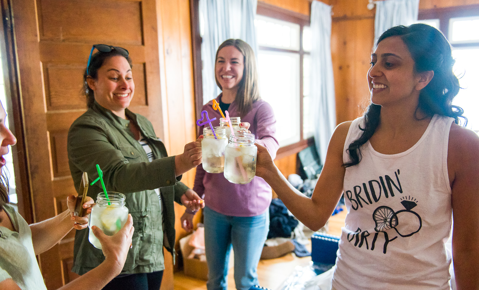 Bride toasting bridesmaids