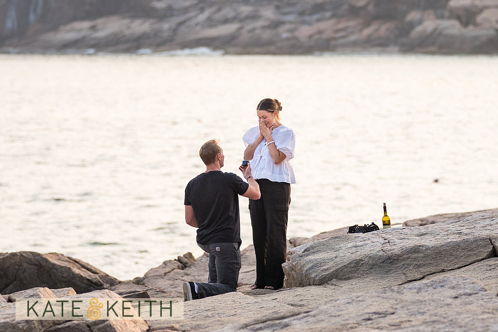 Acadia secret proposal with man on one knee