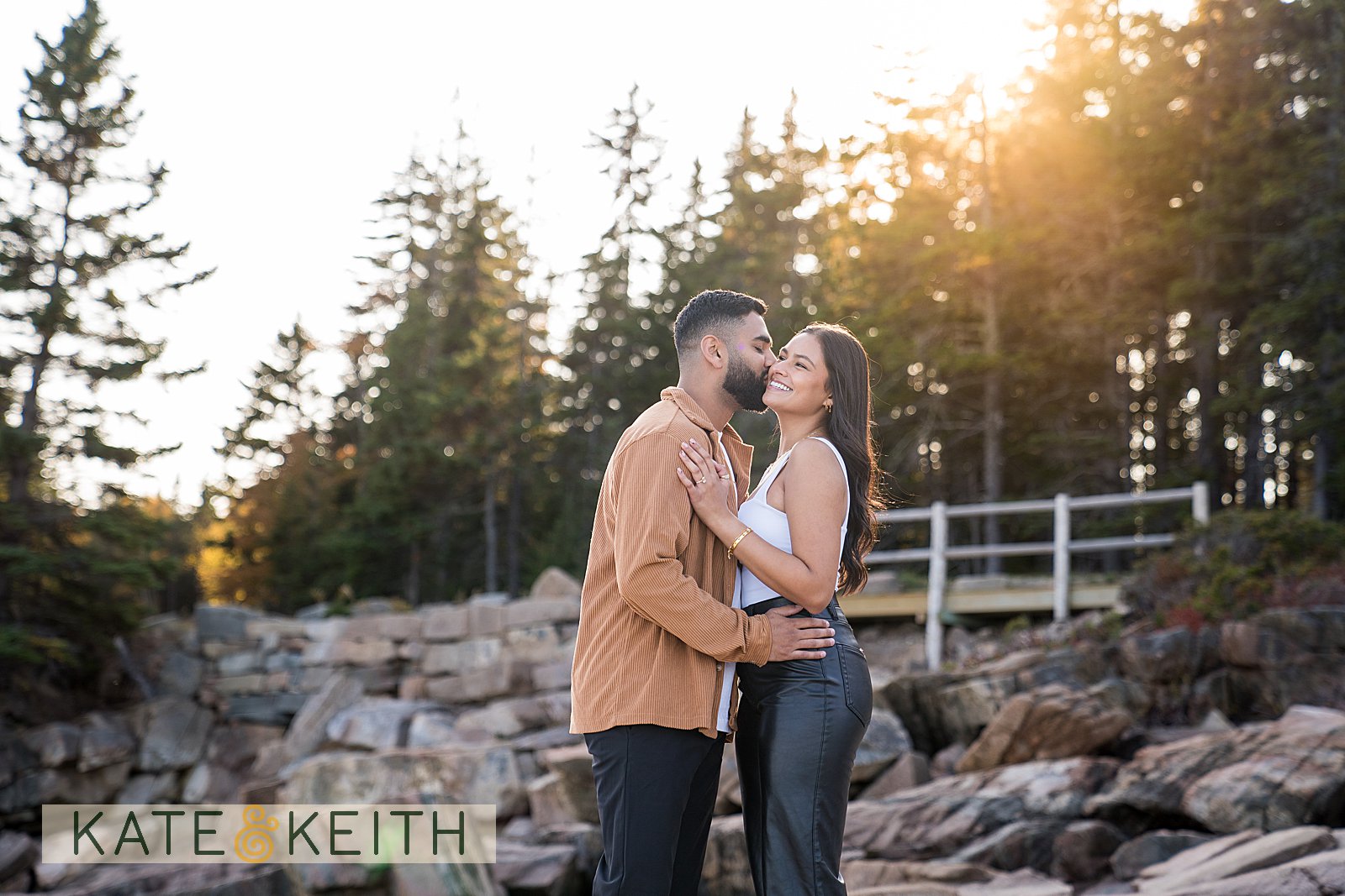 Couple kissing at sunset on the Park Loop